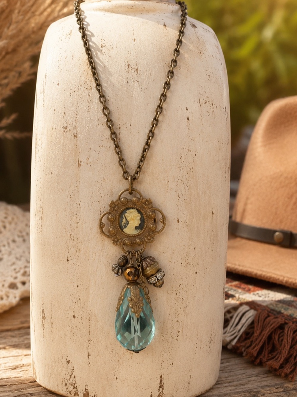 Antique-Style Brass Necklace with Teal Crystal Pendant